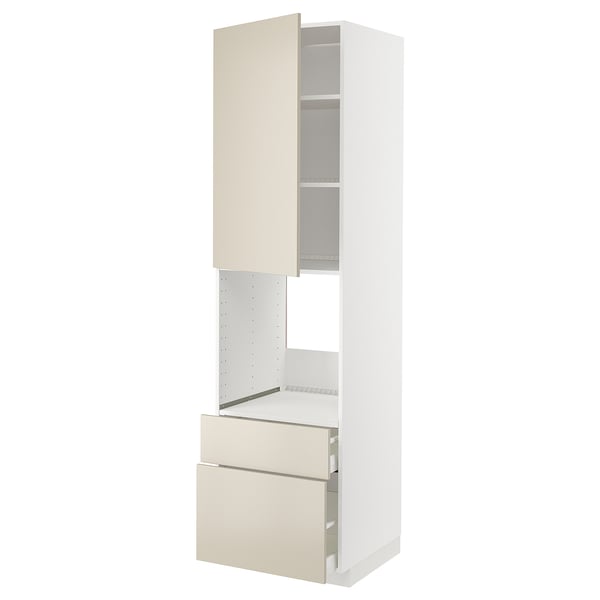 A white METOD kitchen unit with beige havstorp fronts. It cabinets, drawers, and a ventilated shelf.