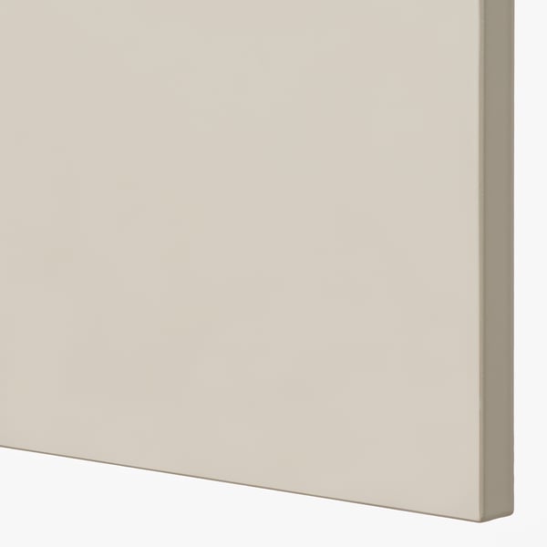 Close-up of sleek, beige kitchen cabinet, smooth and stylish.