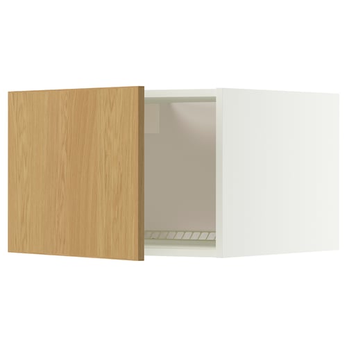 A white METOD cabinet with a light oak veneer door partially open. The cabinet has a rectangular shape with clean lines and a modern design.
