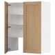 A METOD kitchen cabinet with a light oak door and white interior. It has three adjustable shelves.