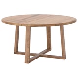 Rustic oak dining table with x-shaped legs.
