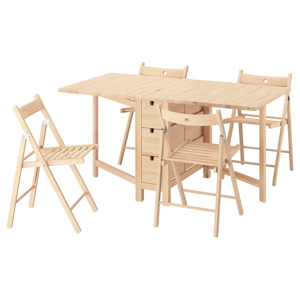 IKEA NORDEN light wood dining set with foldable chairs.