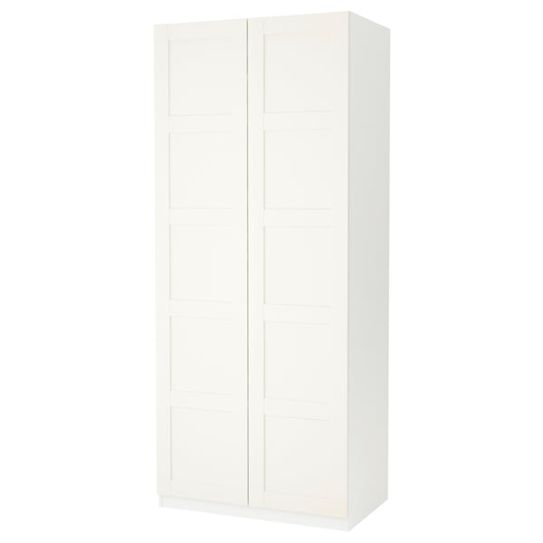 White PAX wardrobe, rectangular shape with two doors, minimalist design.