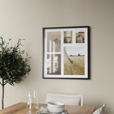 Rustic dining table with white decor, RÖDALM photo collage, green plants.