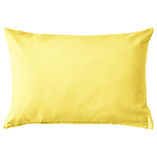 SANELA, a bright yellow, rectangular cushion cover with smooth, velvety texture.