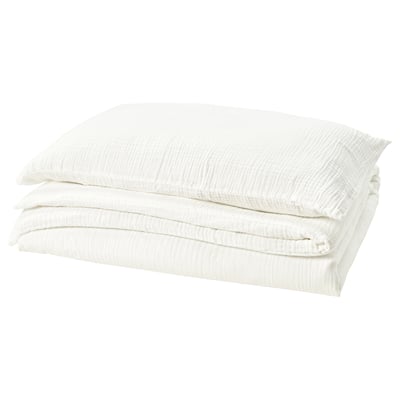 SCHERSMIN white duvet set, soft 100% organic cotton, muslin texture, folded neatly.