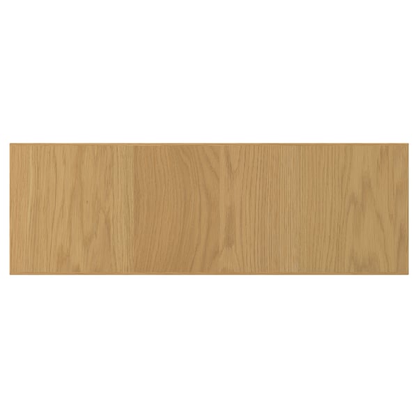 A rectangular wooden panel in a light brown colour, made of oak veneer. It has a solid wood edge, giving it a sturdy and elegant look.