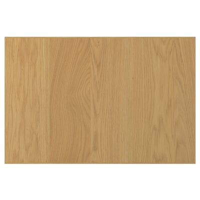 A SINARP wooden surface. Its rectangular, light brown, and made from oak veneer with a solid wood edge.
