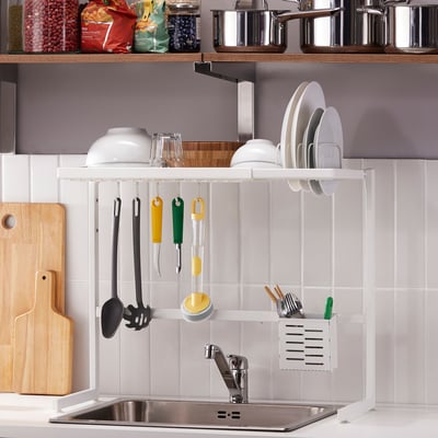 Kitchen sink dish drainer for plates, bowls, glasses, and utensils. Adjustable, fits most sinks, keeps counters tidy.