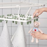 Slibb Showcase SLIBB hang dryer 24 clothes pegs, green - IKEA