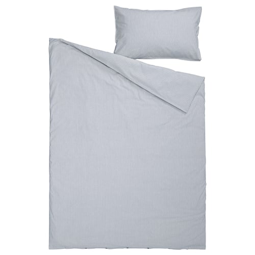 Blue and white striped bedding set with pillow, rectangular shape.