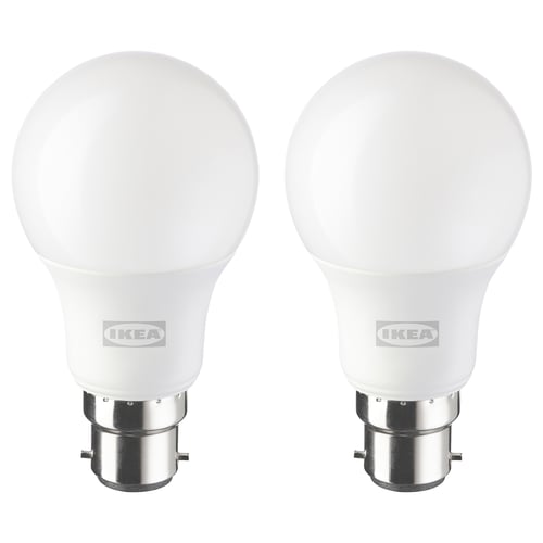 Two white ikea led light bulbs with silver bases, round shape, frosted design.