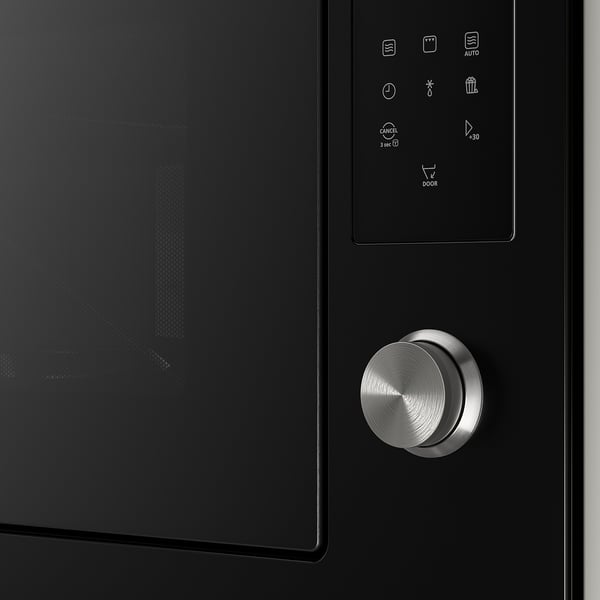 Black microwave with sleek digital touch controls and a metallic knobs.