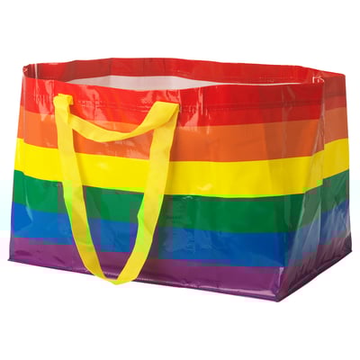Rainbow-colored ikea STORSTOMMA tote bag with yellow handles, rectangular shape, made of shiny material.