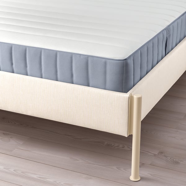 TÄLLÅSEN Upholstered bed frame with mattress, Kulsta light beige/Valevåg extra firm, Queen