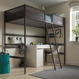 Black loft bed with desk and chair, efficient space use, well-lit.