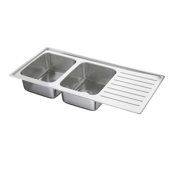 A VATTUDALEN sink. It is rectangular, made of stainless steel, and has two bowls and a drainboard on the right. Its silver in colour.