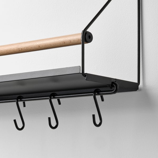 Sleek wall organiser with shelf, hooks, and rail; sturdy, modern design.