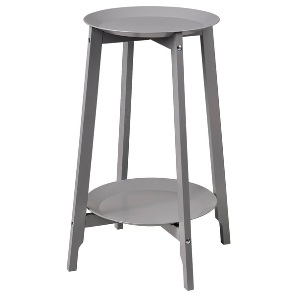 A grey ALPVIDE plant stand with a round steel tray and wooden legs in a minimalist design.