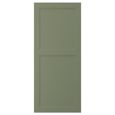A green, rectangular cabinet door with a simple raised panel design.