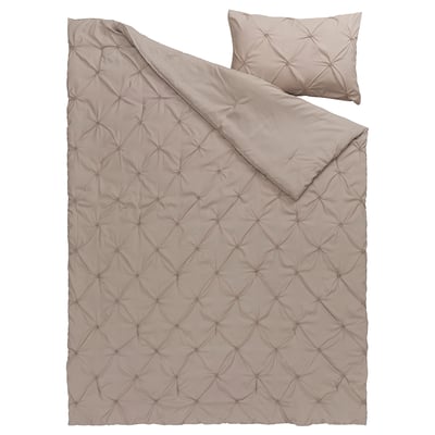 A BÄGARKLOCKA comforter set in beige, with a textured pintuck design, made of recycled polyester, suitable for a cosy bed.