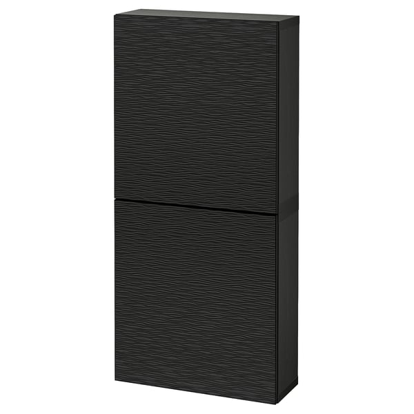 Black BESTÅ cabinet with sleek, dark wood grain effect, rectangular, wall-mounted design, featuring soft-close or push-open doors.