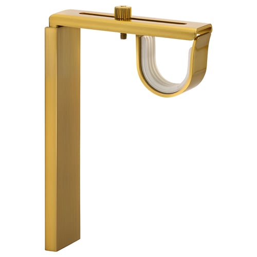 A gold BETYDLIG curtain rod holder. Its adjustable for wall or ceiling mount and designed for versatile curtain hanging solutions.