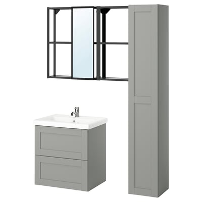 Modern grey bathroom setup: wall mirror, cabinet, and sink. Sleek, minimalist design.