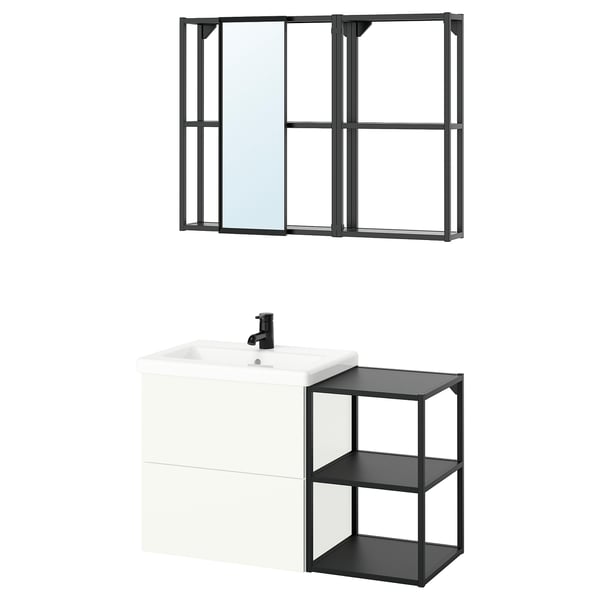 A white and black ENHET bathroom setup with a wall-mounted mirror, sink, and storage units.