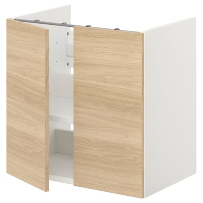 An ENHET bathroom cabinet with wooden doors.
