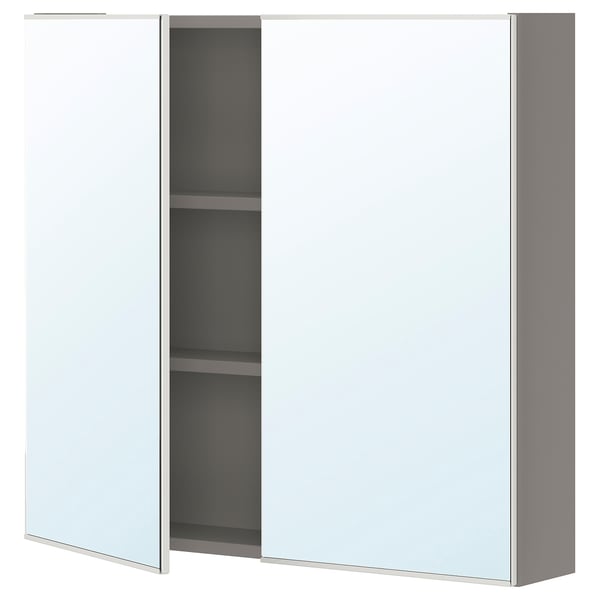 White ENHET wall cabinet with mirror doors and two shelves, perfect for modern bathrooms.