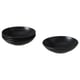 Four FÄRGKLAR deep black bowls, modern matte stoneware design.