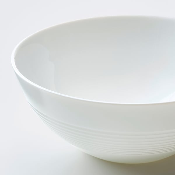 White bowl with ribbed edge, smooth finish, opal glass.