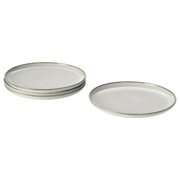 Two round, sandy-glazed ceramic plates with a simple, rustic design, made of stoneware.