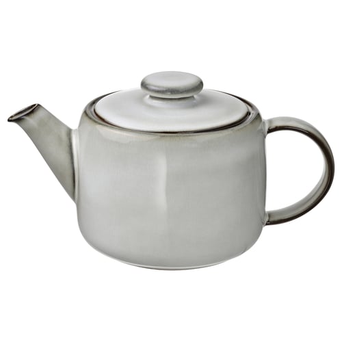 A GLADELIG teapot, white with a sandy glaze, made of stoneware, featuring classic and timeless design.