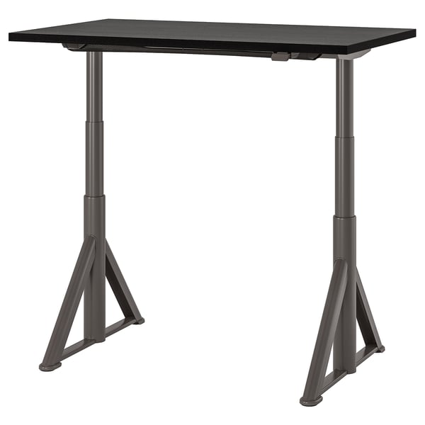 Black IDÅSEN adjustable height desk with metal legs.