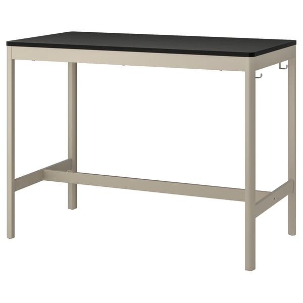 An IDÅSEN meeting table with a black top and metal legs.