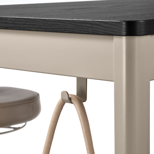 Modern office table with adjustable stool hook, sleek design, and sturdy metal frame.