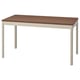IDÅSEN office table with brown top and beige legs.