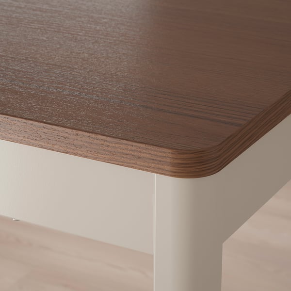 Close-up of high-quality wooden table edge, smooth grain texture and elegant finish.