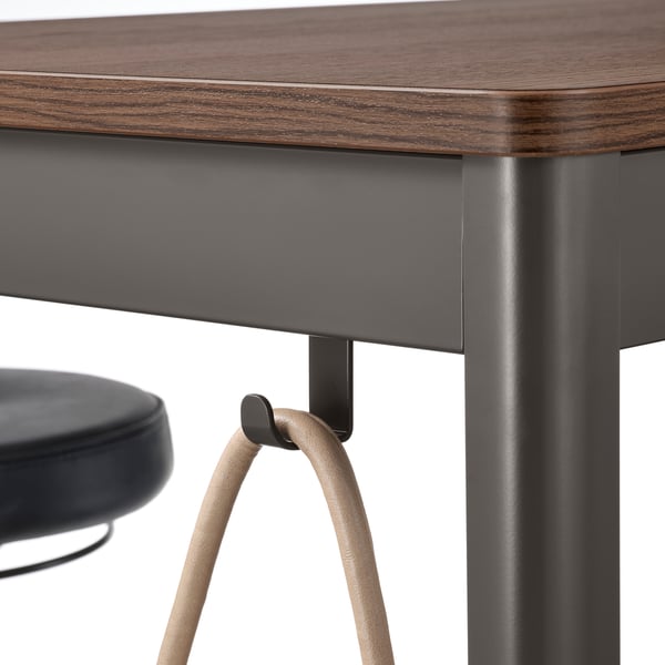 Wooden tabletop desk with a black metal frame and a curve-legged stool, suitable for meetings or study.