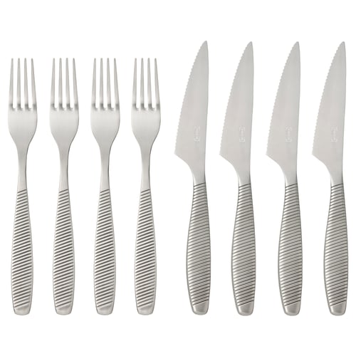 IKEA 365+ cutlery set with stainless steel forks and serrated knives. Modern design with ribbed handles for grip. Eight pieces, clean and functional.