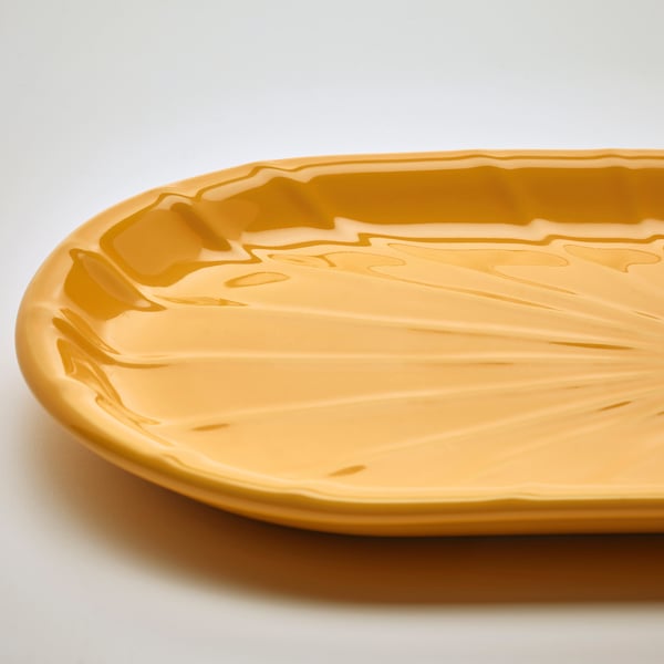 Elegant yellow dish, textured, decorative