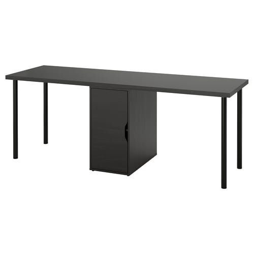 An IKEA LAGKAPTEN desk in black with a central storage cabinet, supported by metal legs.