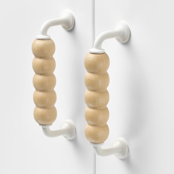 Handcrafted wooden handles, natural finish, attached to white fixtures. Elegant & simple design, showcasing quality craftsmanship.