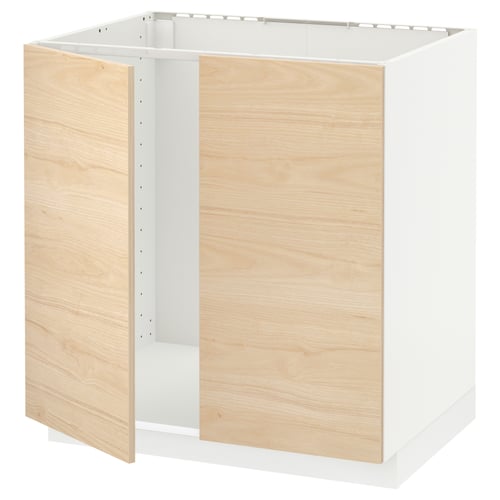 An ikea METOD kitchen cabinet in white and light ash wood. Its rectangular, with a sturdy frame, and has a modern, minimalist design.