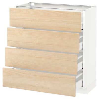 A white METOD kitchen cabinet with light ash-colored drawers. It has a modern, sleek design with four self-closing drawers.