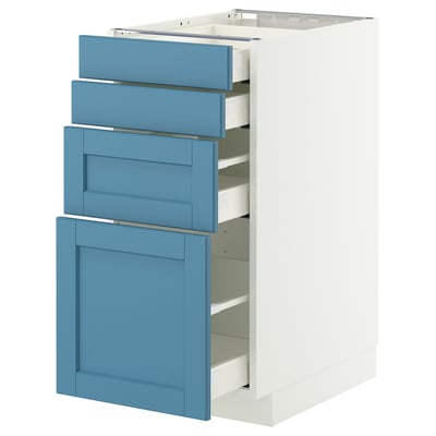 A white and blue METOD kitchen cabinet with multiple drawers. It a sleek design with a sturdy frame and a smooth finish.