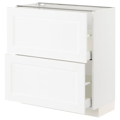 A white METOD kitchen cabinet with two drawers, one door, and a top shelf.