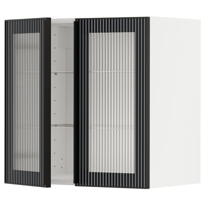 Modern black cabinet with ribbed glass doors and adjustable shelf.